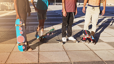 Buy stock photo Cropped shot of a group of skaters standing together