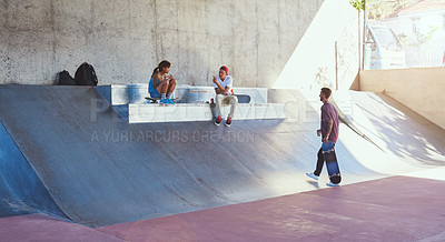 Buy stock photo Shot of skaters having lunch together