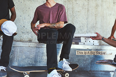 Buy stock photo Cropped shot of skaters sitting together