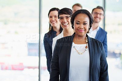 Buy stock photo Portrait of a team of diverse colleagues standing together in a line at the office