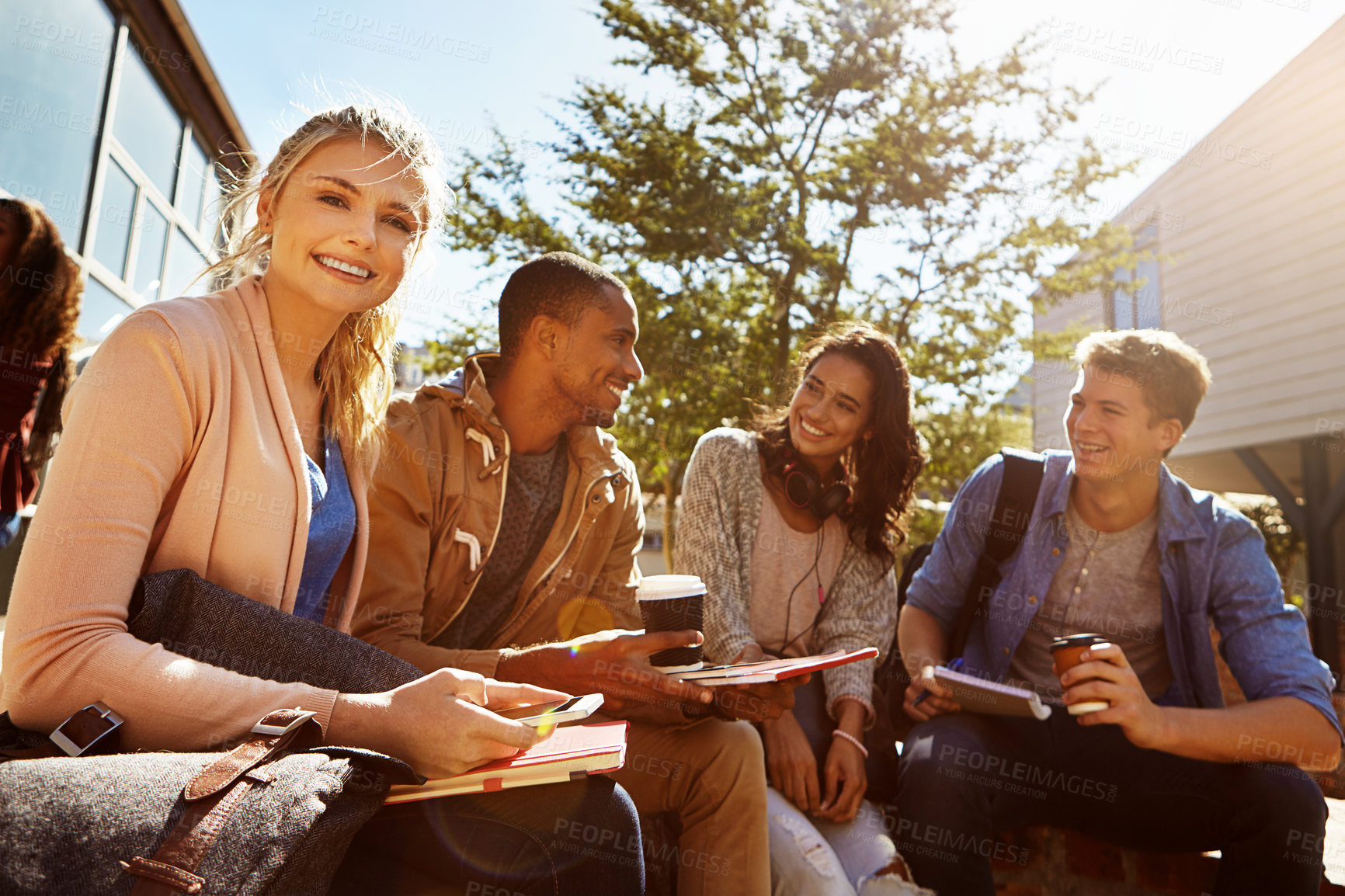 Buy stock photo Portrait of a student studying outside on campus with her classmates