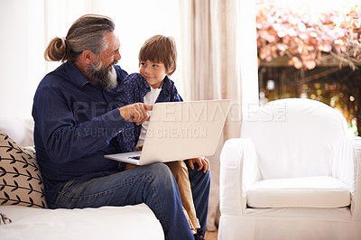 Buy stock photo Grandfather, child or laptop on couch to relax, love or bonding together for cartoon in living room. Happy family, boy or computer for fun on internet games or streaming a movie subscription in home