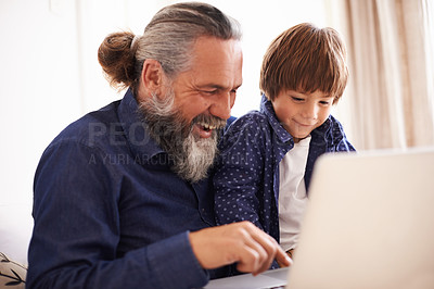 Buy stock photo Smile, laptop and grandfather with boy and games, playing and fun in home living room. Happy, streaming or elearning online and internet in house with child, technology and computer for learning