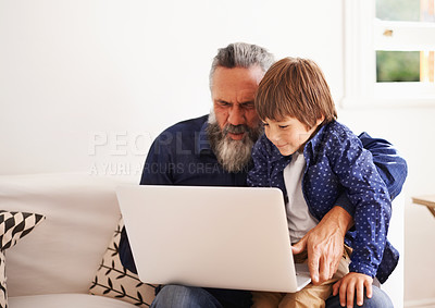 Buy stock photo Grandfather, laptop and boy child for games, elearning and bonding in living room. Kids, family and internet for play or learning online, childhood development and streaming on technology for learn