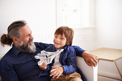 Buy stock photo Dad, son and play with toy, airplane and fun in home or house with joy. Father, child and happiness with smile, youth and childhood development for future growth and bonding or single parent care