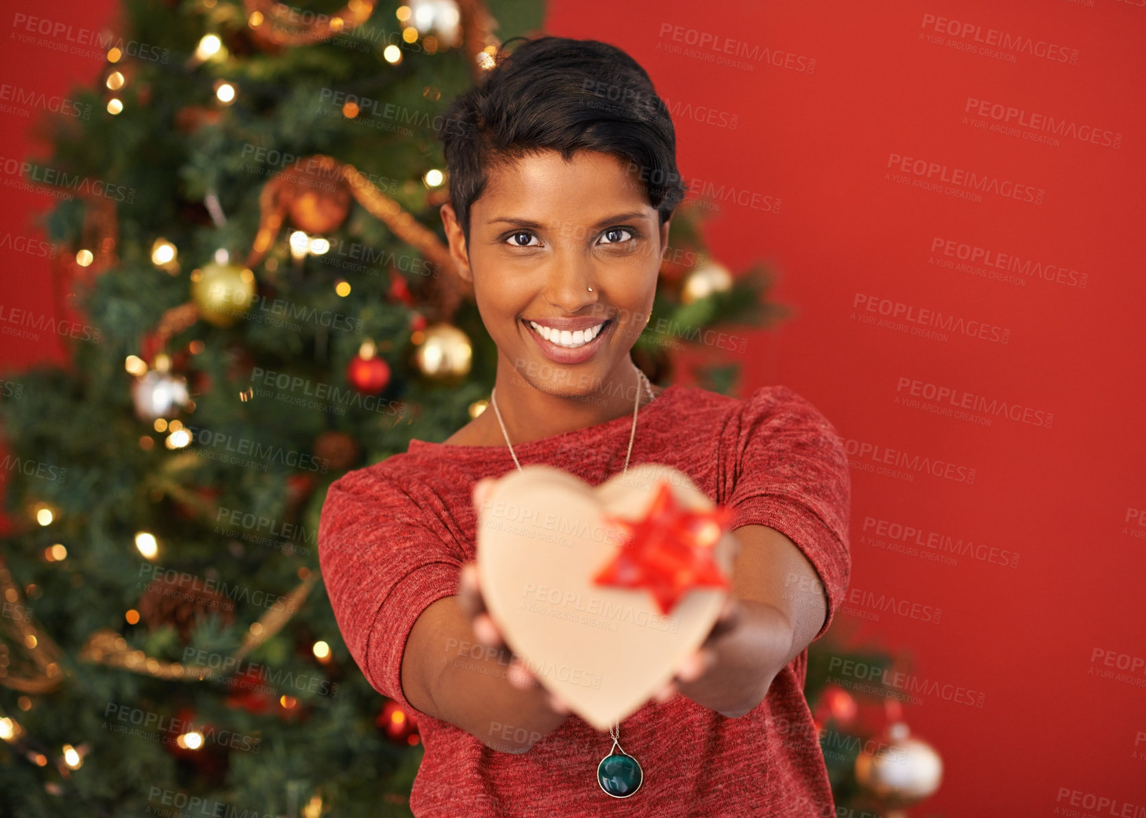 Buy stock photo Christmas, heart and portrait of happy woman with gift in box or package at home for holiday celebration on mockup space in India. Xmas, face and giving present for love on festive season in house