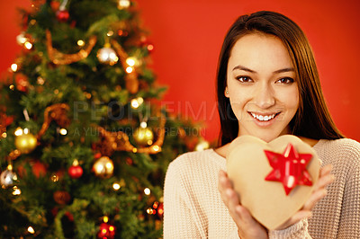 Buy stock photo Portrait, excited and Christmas with woman, gift box and surprise on a red studio background. Face, person or girl with Xmas parcel and present with package or guessing with giveaway prize or holiday