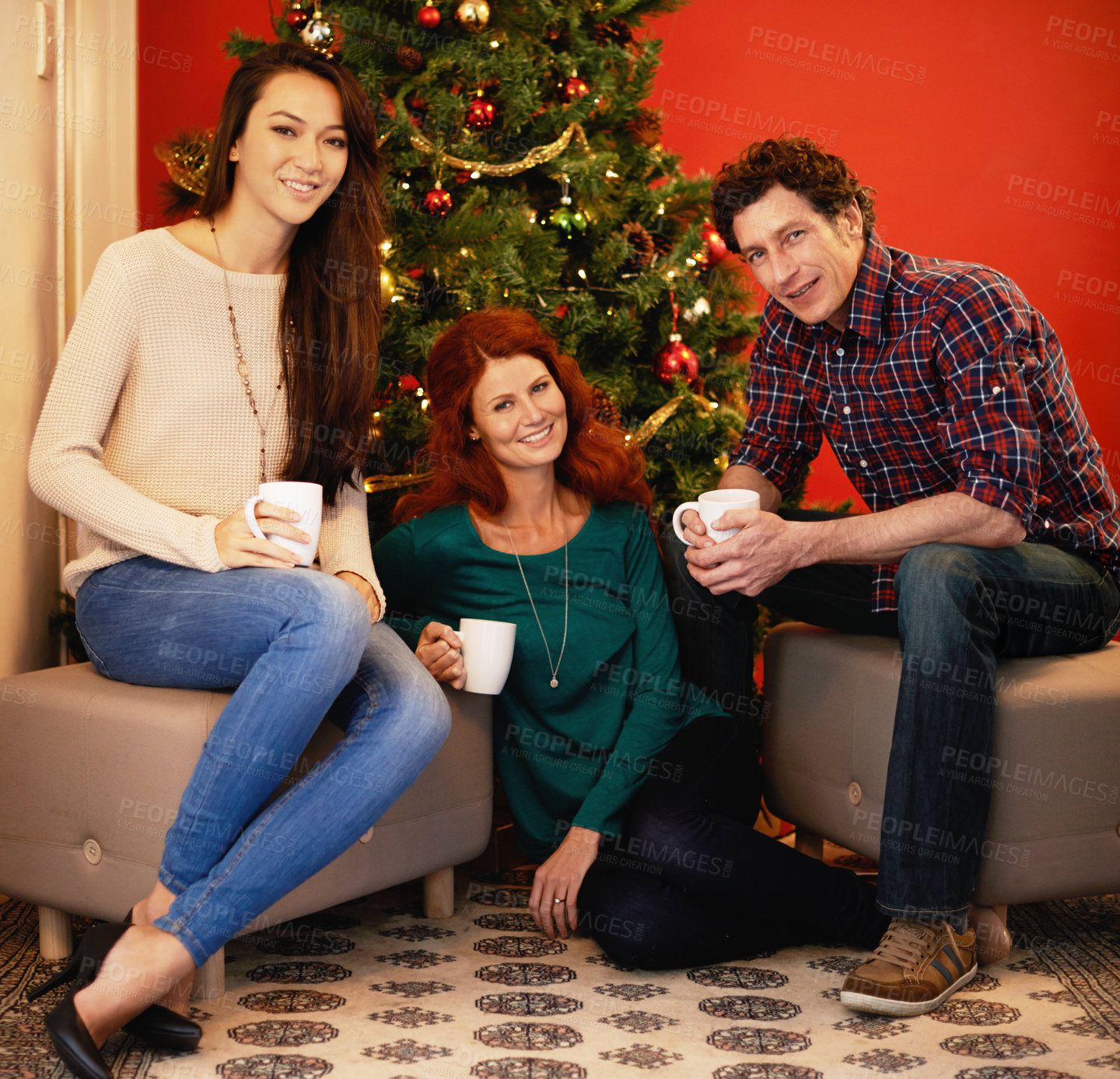 Buy stock photo Friends, Christmas and coffee in home, tree with decor in living room for holiday with beverage. Hot chocolate, smile or people together, Christian celebration on Xmas eve and happy in winter season
