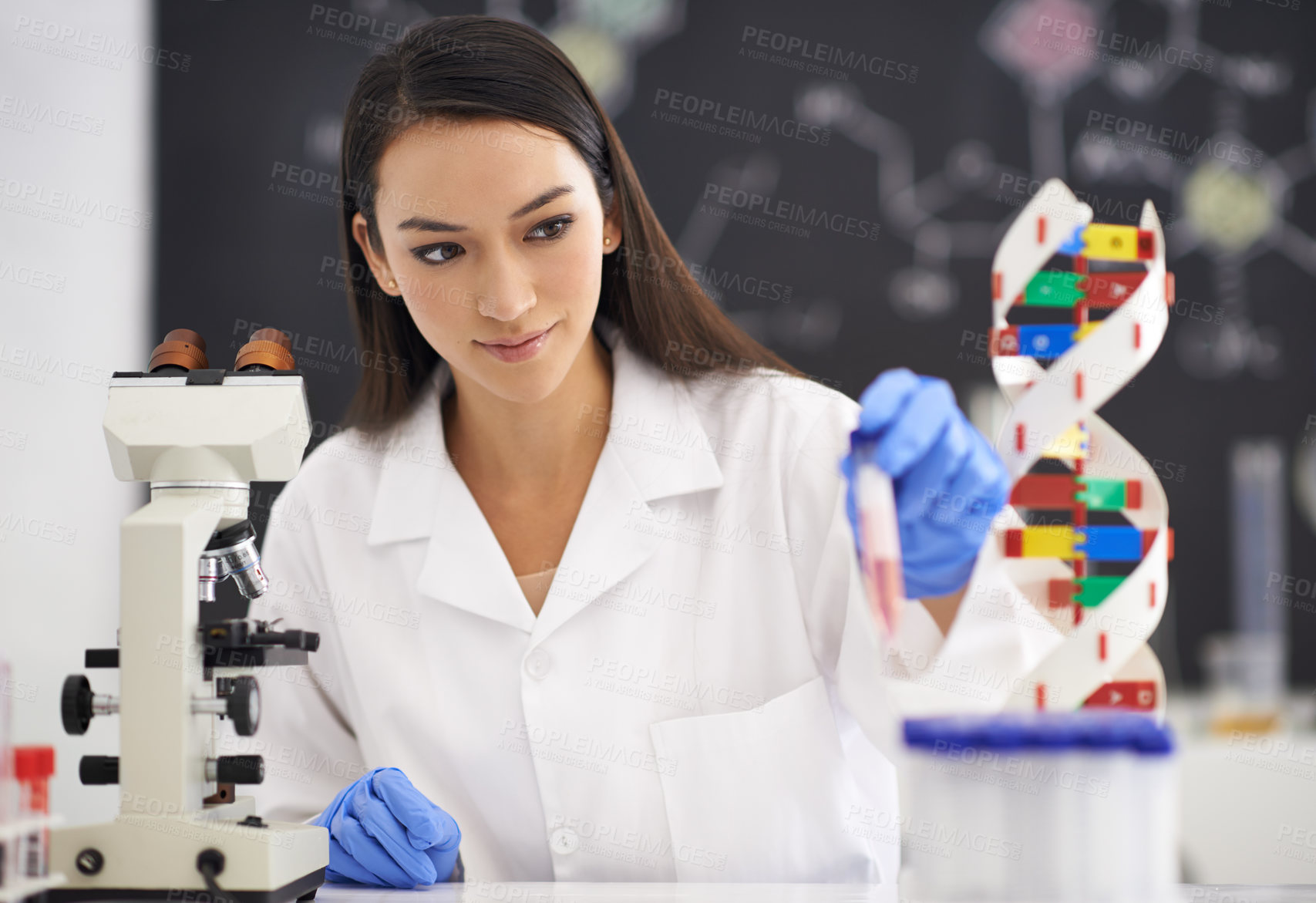 Buy stock photo Science, dna and doctor in laboratory with container for particles, analysis and research for medical career. Professional, blood and chemistry with microscope, analytics and results for study