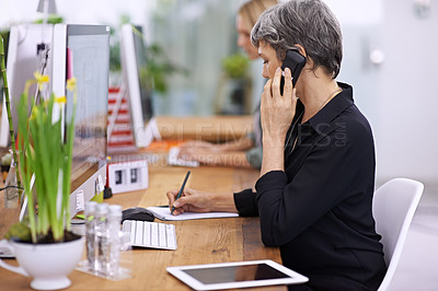 Buy stock photo Business woman, phone call and manager writing notes, communication or listen in startup. Mature professional, cellphone and conversation for book, info and creative designer on computer at desk