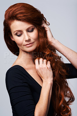 Buy stock photo Hair, woman and studio or health for growth treatment, keratin and highlights in hairstyle. Happy female person, redhead and collagen wellness, natural beauty on model and isolated white background 