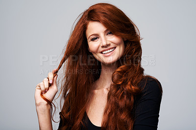 Buy stock photo Woman, haircare and smile with redhead in studio on white background with satisfied look and confidence. Portrait, female person and happy with treatment for routine, repair  and soft for beauty