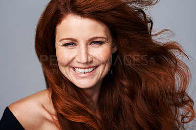 Buy stock photo Hair care, ginger and portrait of happy woman with beauty for treatment, wellness and haircare on gray background. Salon, hairdresser and face of female model with red, healthy and natural hairstyle