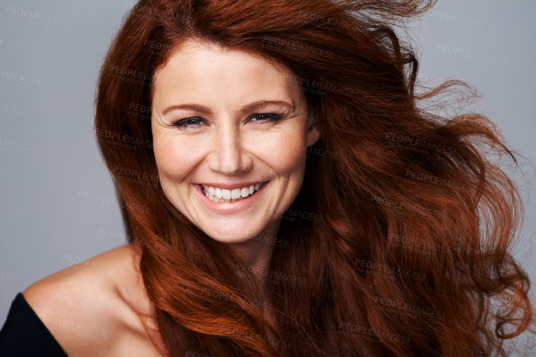 Buy stock photo Hair care, ginger and portrait of happy woman with beauty for treatment, wellness and haircare on gray background. Salon, hairdresser and face of female model with red, healthy and natural hairstyle