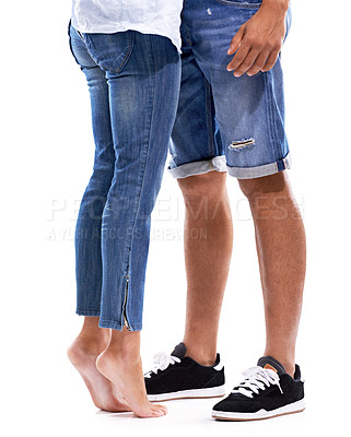 Buy stock photo Cropped studio shot of a loving couple standing close together