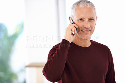 Buy stock photo Senior, man and portrait with smile on phone call in home for communication, discussion and mobile chat. Elderly, person and happy with smartphone for talking, retirement and mockup in living room