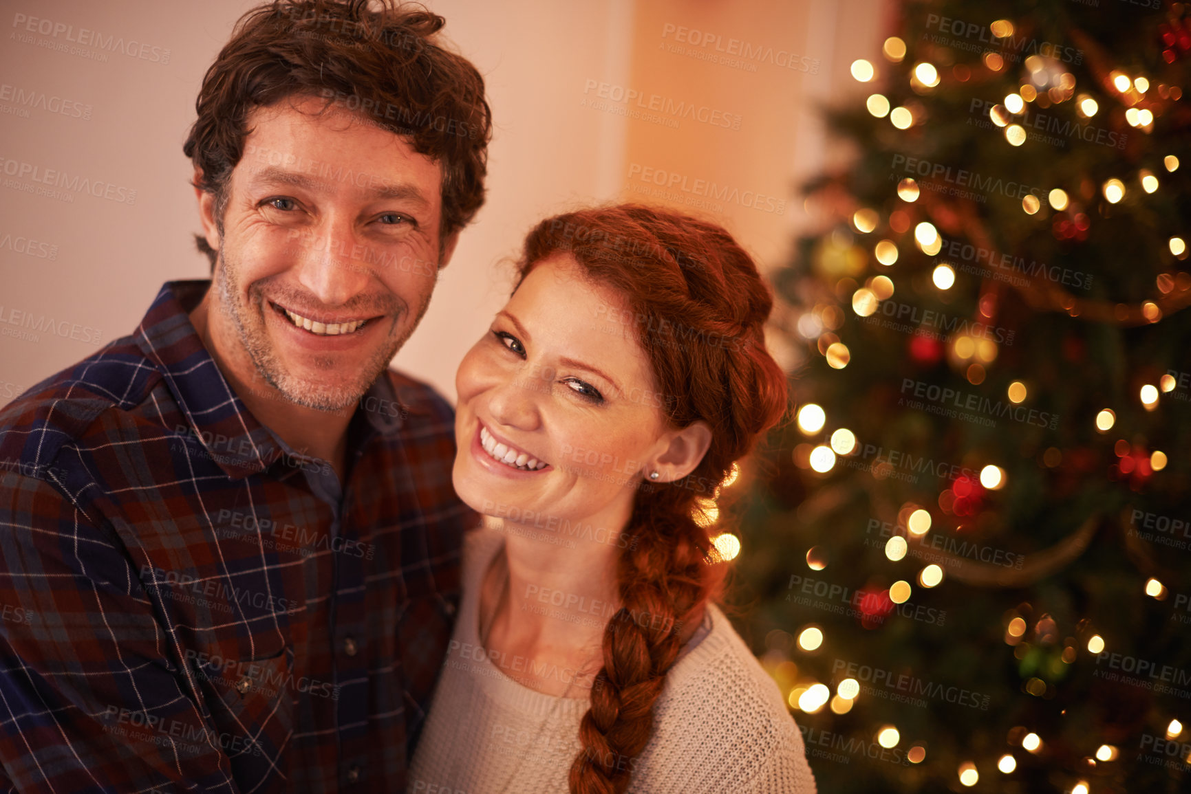Buy stock photo Couple, portrait and Christmas, holiday celebration and festive season of giving for love and commitment. Happiness, hug and support with people at home for tradition, romance and relationship