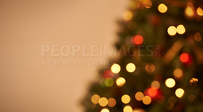 Buy stock photo Cropped shot of a Christmas tree with a scattered Christmas lights