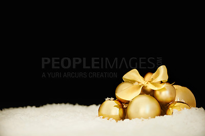 Buy stock photo Shot of stylish Christmas ornaments against a black background