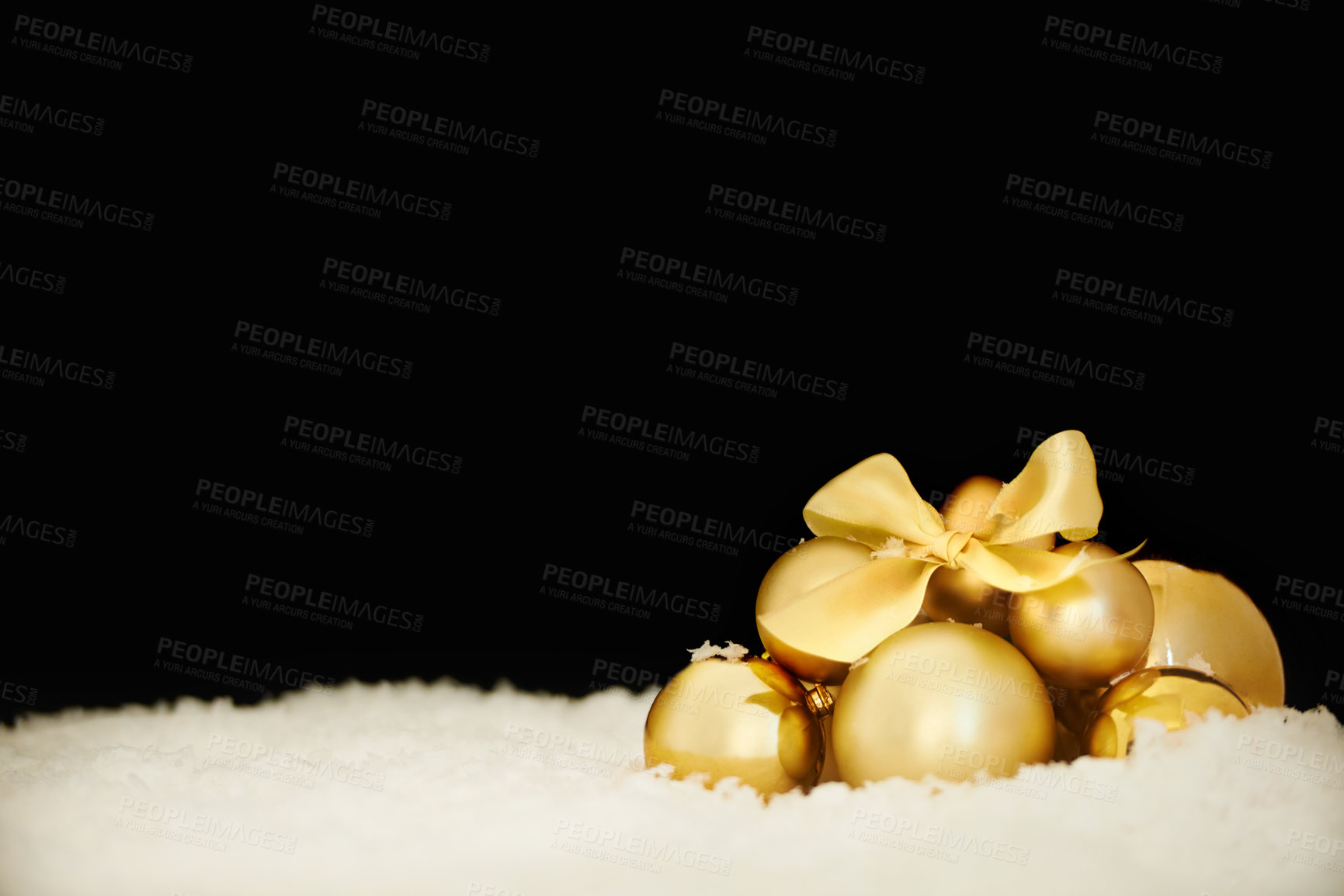 Buy stock photo Shot of stylish Christmas ornaments against a black background