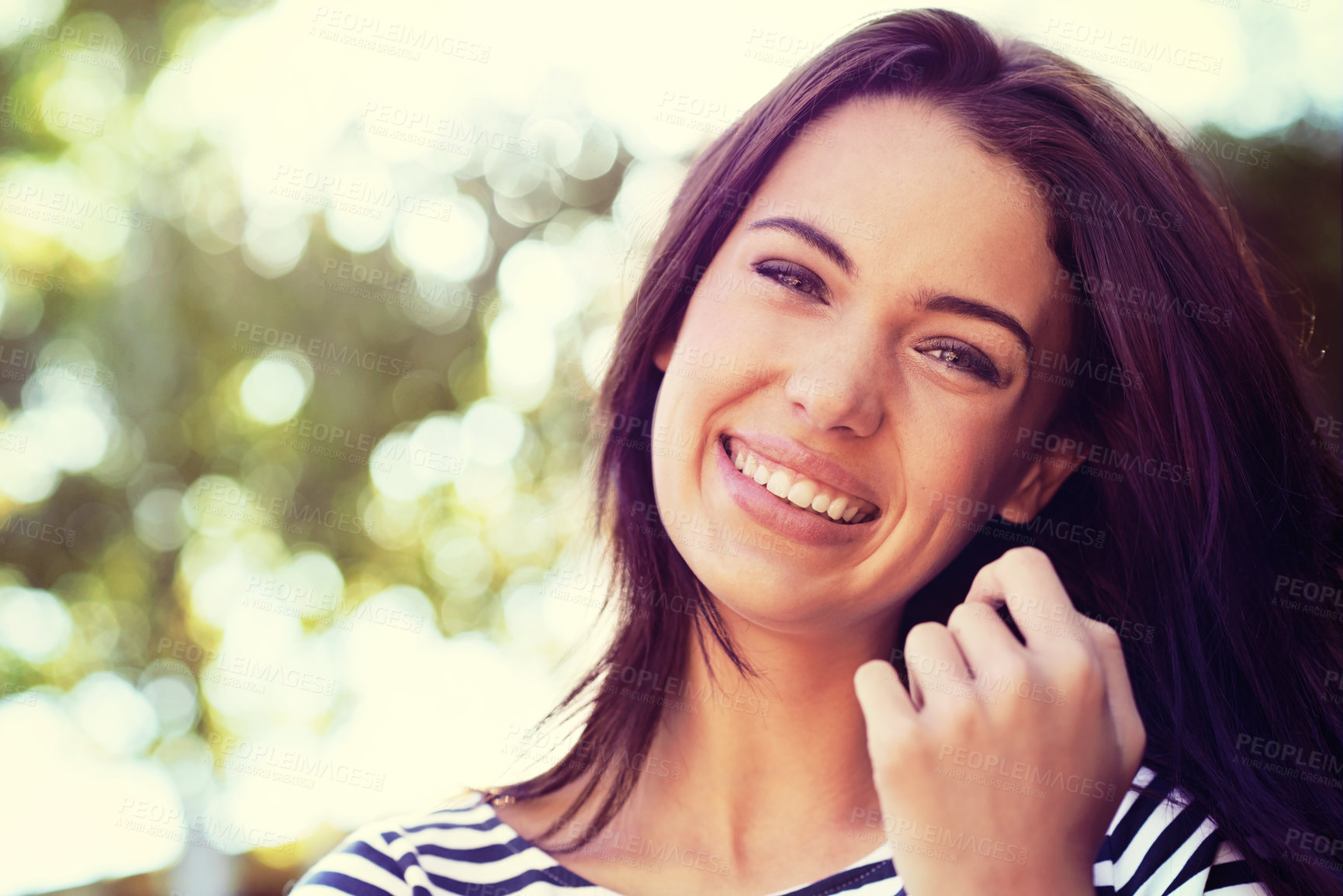 Buy stock photo Woman, portrait and smile with nature, sunshine and park for happiness and wellness. Person, joy and bokeh with closeup, glow and happy for summer relax and adventure outside in garden with trees