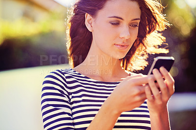 Buy stock photo Woman, communication and typing with phone in neighborhood for outdoor networking in the city. Female person or casual model talking on mobile smartphone for online chatting, texting or social media