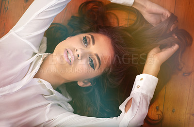 Buy stock photo Beauty, woman or cosmetics on floor for facial glow, above or foundation for make up. Model, cosmetology and eyeliner or mascara on wooden background, brunette and haircare or conditioner in closeup