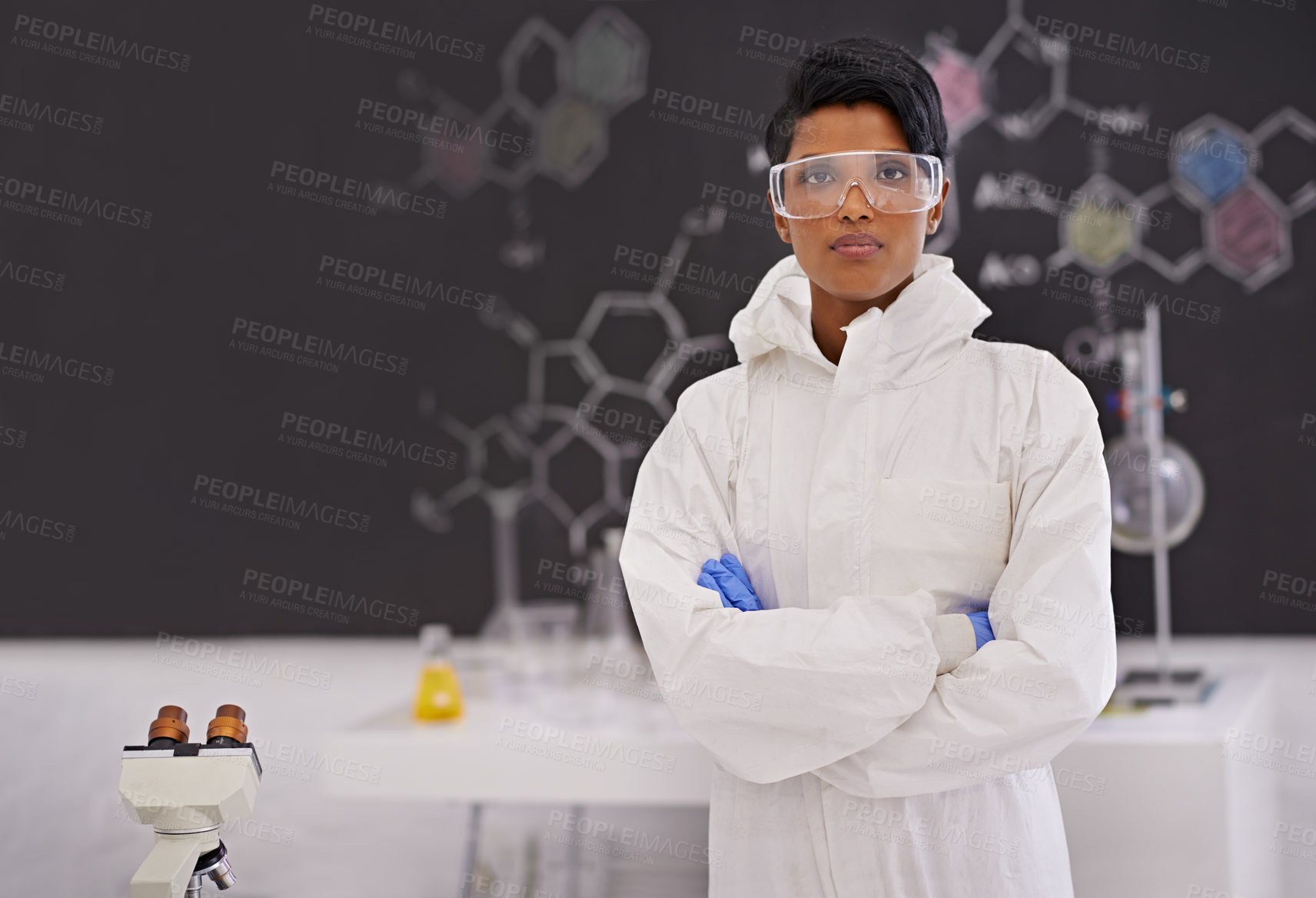 Buy stock photo A portrait of a beautiful young scientist standing proudly in her laboratory