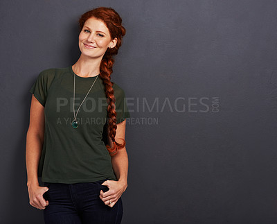 Buy stock photo Studio portrait of a beautiful young woman with her long red hair in a braid