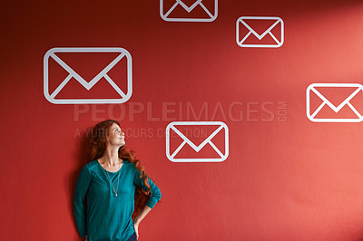 Buy stock photo Happy woman, envelope and thinking with email icon, symbol or graphic on a red studio background. Female person or creative journalist with smile in thought for global communication on mockup space