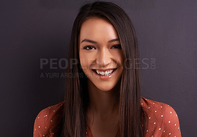 Buy stock photo Portrait, smile and beauty of woman in studio with hair or skin isolated on gray background. Face, happy person and model, student or young girl in casual clothes laughing on a backdrop in Mexico