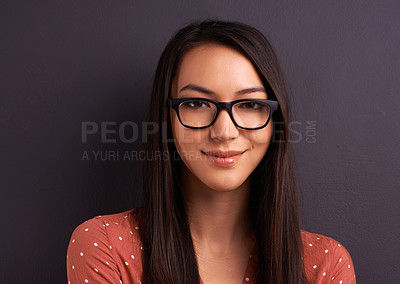 Buy stock photo Portrait, smile and woman with glasses, happiness and person on a grey studio background. Face, model and girl with eyewear and mockup space with optometry and iris with sight and see with looking