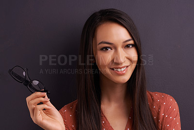 Buy stock photo Woman, portrait and glasses in studio for vision prescription  with confident smile, grey background or mockup space. Female person, eyewear and frame for healthy optometry, eye care or spectacles