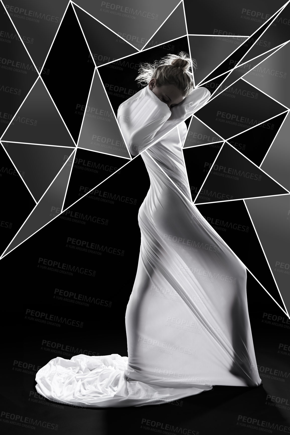 Buy stock photo Studio shot of a woman wrapped in fabric and surrounded by geometric shapes against a black background