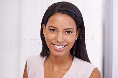 Buy stock photo Portrait of an attractive young businesswoman working on a digital tablet