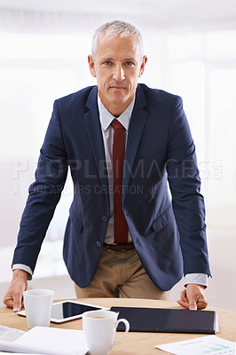 Buy stock photo Serious, office and portrait of business man with confidence for career, job and working. Professional, corporate agency and senior person at desk for company pride, startup and entrepreneurship