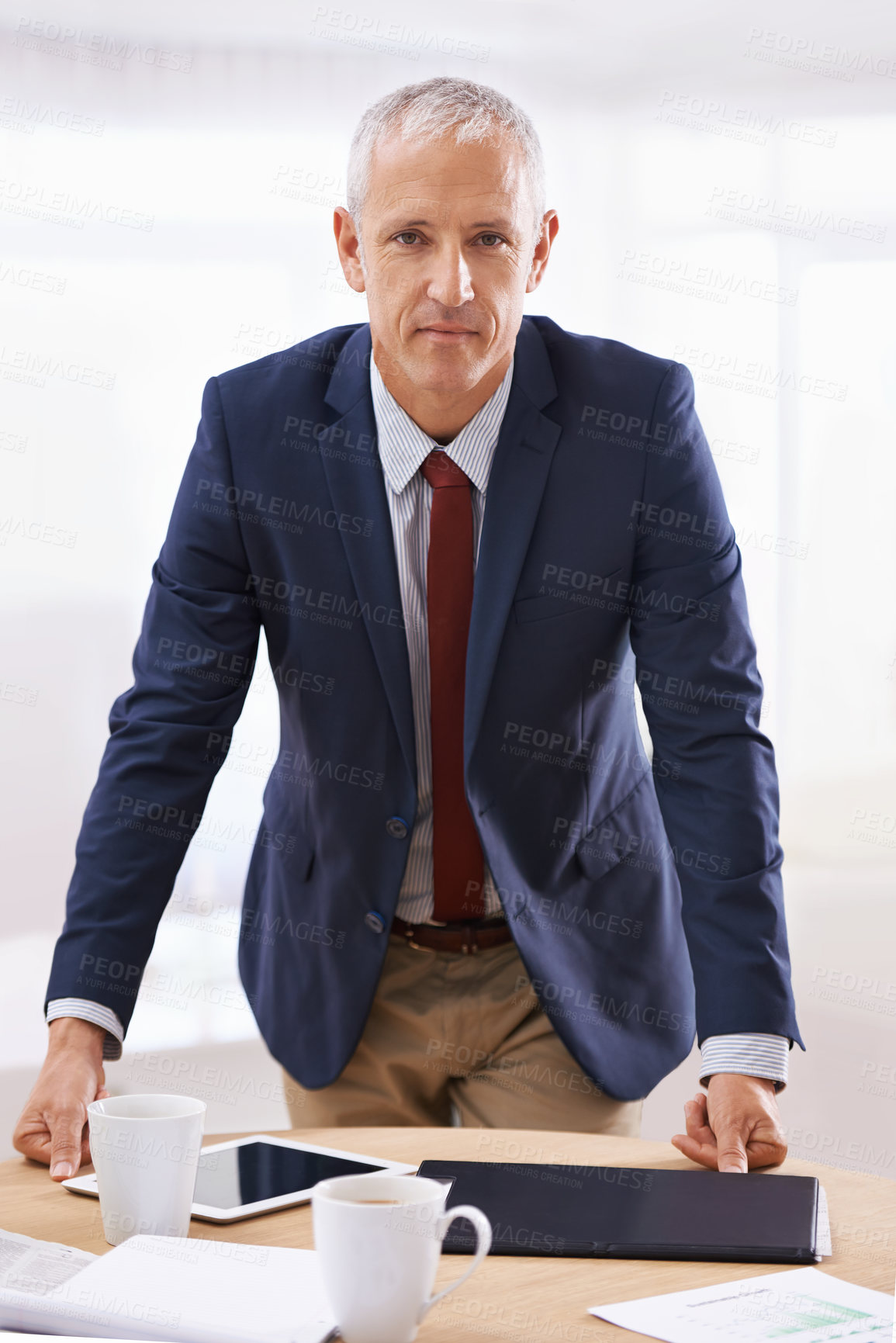 Buy stock photo Serious, office and portrait of business man with confidence for career, job and working. Professional, corporate agency and senior person at desk for company pride, startup and entrepreneurship