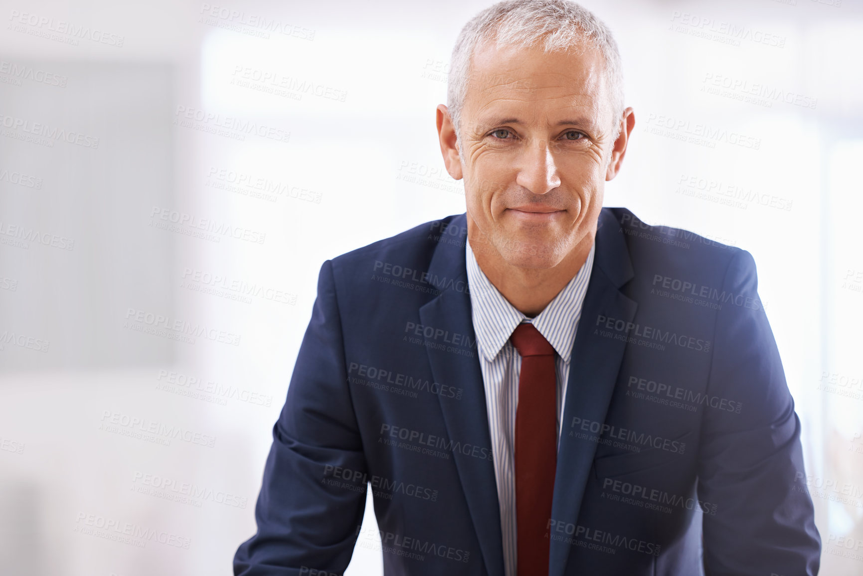 Buy stock photo Shot of a mature businessman looking confident