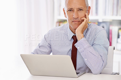 Buy stock photo Laptop, portrait and senior businessman in office thinking, planning or checking email, review or social media feedback. Face, calm or old male executive with pc for online, research or communication