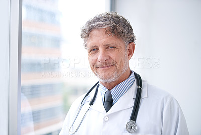 Buy stock photo Senior man, doctor and smile portrait in office for healthcare, medical support and medicine career with stethoscope. Mature, face and health expert with confidence and happy for cardiology in clinic