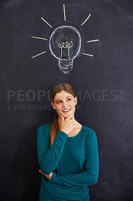 Buy stock photo Thinking, creative and woman with light bulb on chalkboard for inspiration, brainstorming and problem solving. Idea, question and person on background with icon for solution, thoughtful and planning