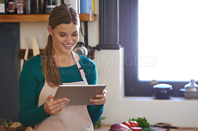 Buy stock photo Woman, cooking and tablet in kitchen with vegetables or lunch preparation, connection or recipe. Female person, smile and internet research for vegan meal or nutrition, organic food or balanced diet