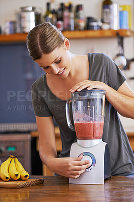 Buy stock photo Kitchen, smile and woman on blender for smoothie, nutrition or food for healthy diet at table in home, Happy person, fruit and mixer for drink, juice or ingredients for wellness with organic beverage