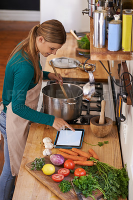 Buy stock photo Woman, cooking and tablet with vegetables for nutrition meal in kitchen or online recipe, diet or connectivity. Female person, home and ingredients with internet or vegan eating, prepare or hungry