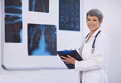 Buy stock photo Senior doctor, woman and clipboard in radiology for surgery with anatomy scan and healthcare in portrait. Medical professional, treatment and surgeon in room for xray, medicine and confident expert
