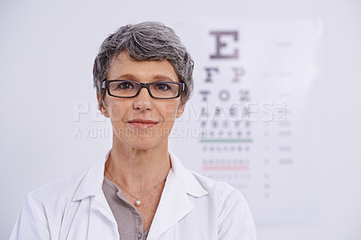 Buy stock photo Portrait, senior woman and optometrist for eye care, letter chart for exam with doctor at clinic. Alphabet, glasses for vision and prescription lens, assessment and ophthalmology for spectacles