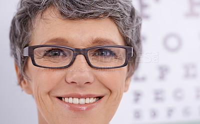 Buy stock photo Face, senior woman and optometrist smile for eye care, professional and advice with doctor at clinic. Portrait, glasses for vision and prescription lens, assessment and ophthalmology for spectacles