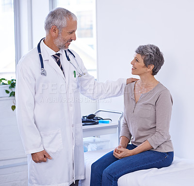 Buy stock photo Healthcare, support and senior woman with doctor in a consultation room for examination, results or help. Hospital, face and elderly patient consulting health expert for medical, diagnosis and advice