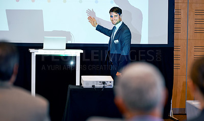 Buy stock photo Business man, podium and presentation, point at projector screen at conference or workshop with laptop for PPT. Corporate training, seminar and speaker with info, audience and professional speech