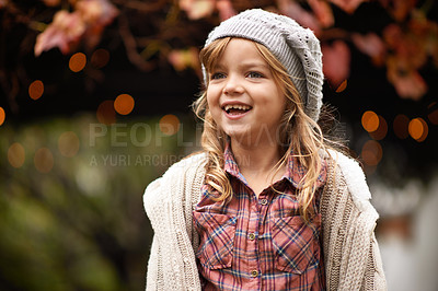 Buy stock photo Happy, excited and face of child in park with smile for playing, freedom and adventure outdoors in woods. Childhood, happiness and young girl in nature for playful, relaxing and fun in autumn season